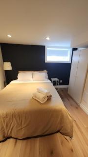 The Comfort Zone- Entire Private 1-bed Basement apt, Sauna, Hot Tub, 8 min Subway - 2
