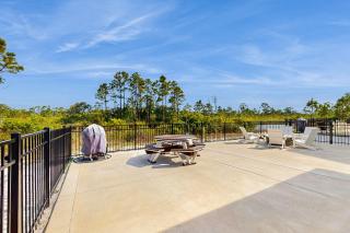 Coastal home with shared zero entry pool putting green and WIFI - 7