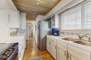 Serene sound-front home with a covered patio dock and swing bed - 3