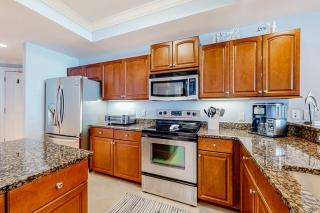 Gulf-front condo with a beach view pools hot tub tennis & fitness room - 2