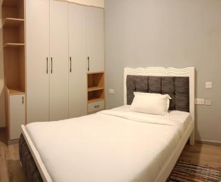 Royal essence apartment with heated swimming pool ,ample parking ,fully equipped gym, child playground and amazing scenic city view - 5