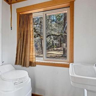 Tranquil Woodland Cabin Getaway with Cozy Indoor Fireplace in Jacksonville, Oregon - 1