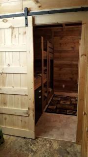 Claxton's Riverfront Family Fun: Cabin Adventures Await - 8