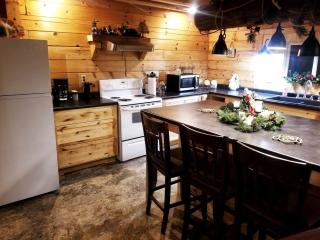 Claxton's Riverfront Family Fun: Cabin Adventures Await - 5