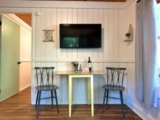 Cozy Vintage Lake Cabin with Hot Tub & Beach Access near Traverse City, Northern Michigan - 1