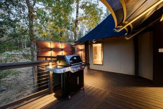 Hot Springs Retreat: Luxe Tented Cabin with Waterfront Views and Hot Tub - 1