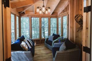 Woodland Wonder: Experience Luxury in a Treehouse in Norway, ME - 7