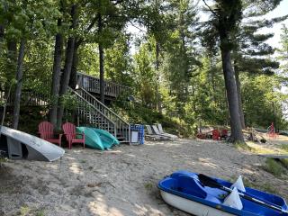 Charming Waterfront Cabins with Hot Tub & Private Beach Access near Traverse City, Michigan - 1