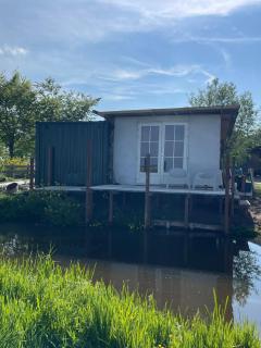 Vrij aan de Amstel Tiny House met hottub aan het water - 2