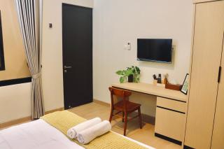 Deluxe Room Rumo Living Jakarta Timur - 5