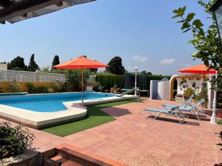 Chalet con piscina playa de Oliva - 9