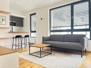 Modern 1BR Apartment with Terrace, Workspace & Free Parking - 1