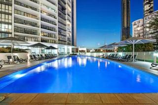 Serene Coastal Apartment with Free Parking Pool Gym - 8