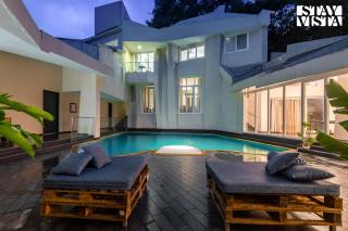 StayVista at Bayside Oasis with Outdoor Pool, WiFi - 9