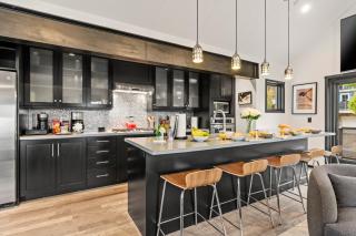 Walk to Ski Slopes Trails Luxury 4-Bedroom Private Home with Private Hot tub BBQ Heated Parking and Two Master Suites PEA-1114 by KBM Resorts - 0