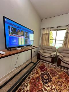 The Green Hut Stylish 2BR Apartment with lounge - 1