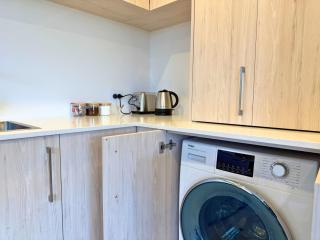 Elegant 2BR Stay with Private Courtyard - 3