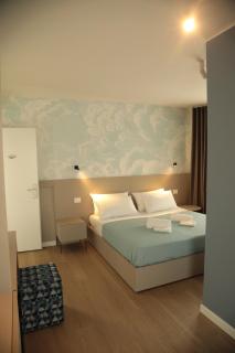 TAU Rooms Srl - 0
