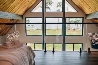 Modern Bayfront Escape with Sweeping Water Views - 1