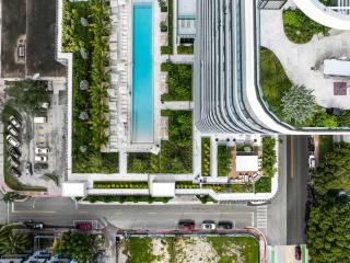 Steps from the Beach - Stylish Condo with Pool - 4