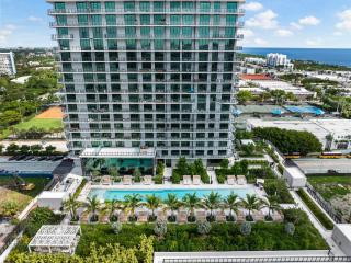 Steps from the Beach - Stylish Condo with Pool - 0