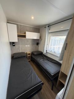MH699 - 4 min à pied de la Fun zone - 3ch - Terrasse et Clim - Camping Les Charmettes 4 étoiles - 4