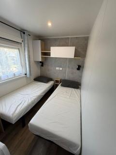 MH699 - 4 min à pied de la Fun zone - 3ch - Terrasse et Clim - Camping Les Charmettes 4 étoiles - 3