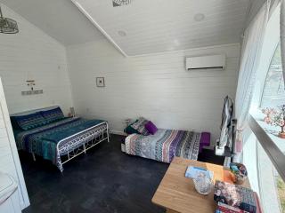 Purple Tiny Home With Fire Pit and Nature - 1