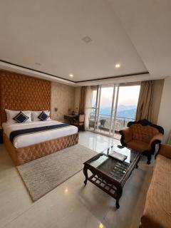 The Zinnia Castle- Dharamshala # Centrally Heated & Air Cooled # Premium Rooms # Lift # Bar # Terrace # Big Parking # Near market # Top Rated # Property of the year - 7