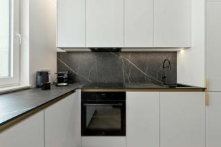 Air-Conditioned Apartment with Parking and Balcony by Noclegi Renters - 3
