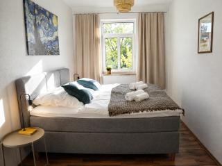 zentrales Apartment mit Fußbodenheizung im ruhigen Hinterhaus, JURA Kaffeevollautomat, Smart-TV, Privater Parkplatz, WIFI, Boxspringbetten - 4