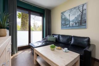 Stylish Apartment with Air Conditioning and a Private Garden by Noclegi Renters - 3
