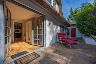 Weiße Reetdachkate Wohnung 1 - 4