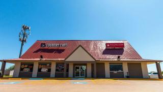 Magnuson Extended Stay and Suites Airport Hotel - 1