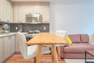 Modern Downtown Condo with Workspace & Balcony - 8