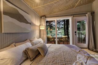 Enchanted Woodland Cabins by the Mountain in Texas with Private Pond and Scenic Trails - 1
