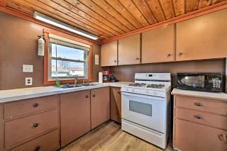 Waterfront Cabin with Kayaks, Dock & Fire Pit in Houghton Lake, Michigan - 1