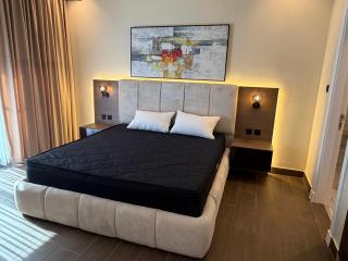Sleek 1BR Modern Heart of Abdali, Amman - 1