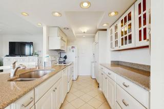 Sea Colony 6th floor condo with balcony shared tennis court & partial ocean view - 3