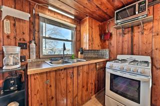 Cozy Lakeside Cabin with Dock & Fire Pit Access in Houghton Lake, Michigan - 8