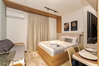 Apartamento 404 - Cena Living · Studio Completo p/ 4 | A/C, Academia e Coworking - 1
