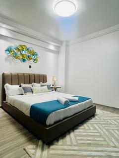 celestial comfort apartments with ample parking space, swimming pool, modern equipped gym, and amazing city views - 1