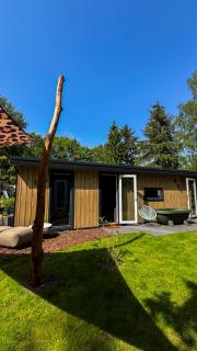 Panterhuis Leo l Tiny House l Buitenbad, airco, speeltuin, bostuin - 9