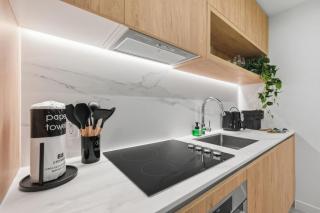 Luxury Studio with Rooftop Pool & City Views - 1