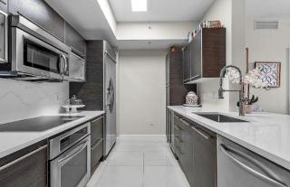Modern 2 Bedroom Condo with Balcony and City Views - 7