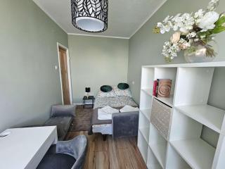 Cozy Apartment with a Balcony Near the Center and PGE Stadium by Noclegi Renters - 9