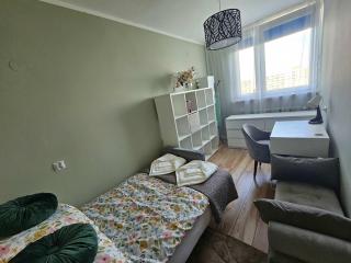 Cozy Apartment with a Balcony Near the Center and PGE Stadium by Noclegi Renters - 4