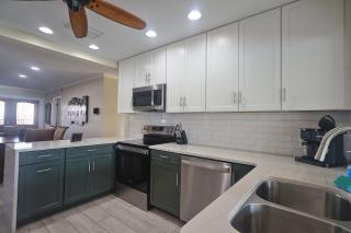 Spacious Waterfront Getaway with Heated Pool - 9