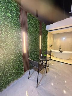 Cozy Escape Bathtub Patio Seating 65 inch TV - 5