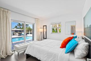 Waterfront Home with Heated Pool and Sunset Views - 5